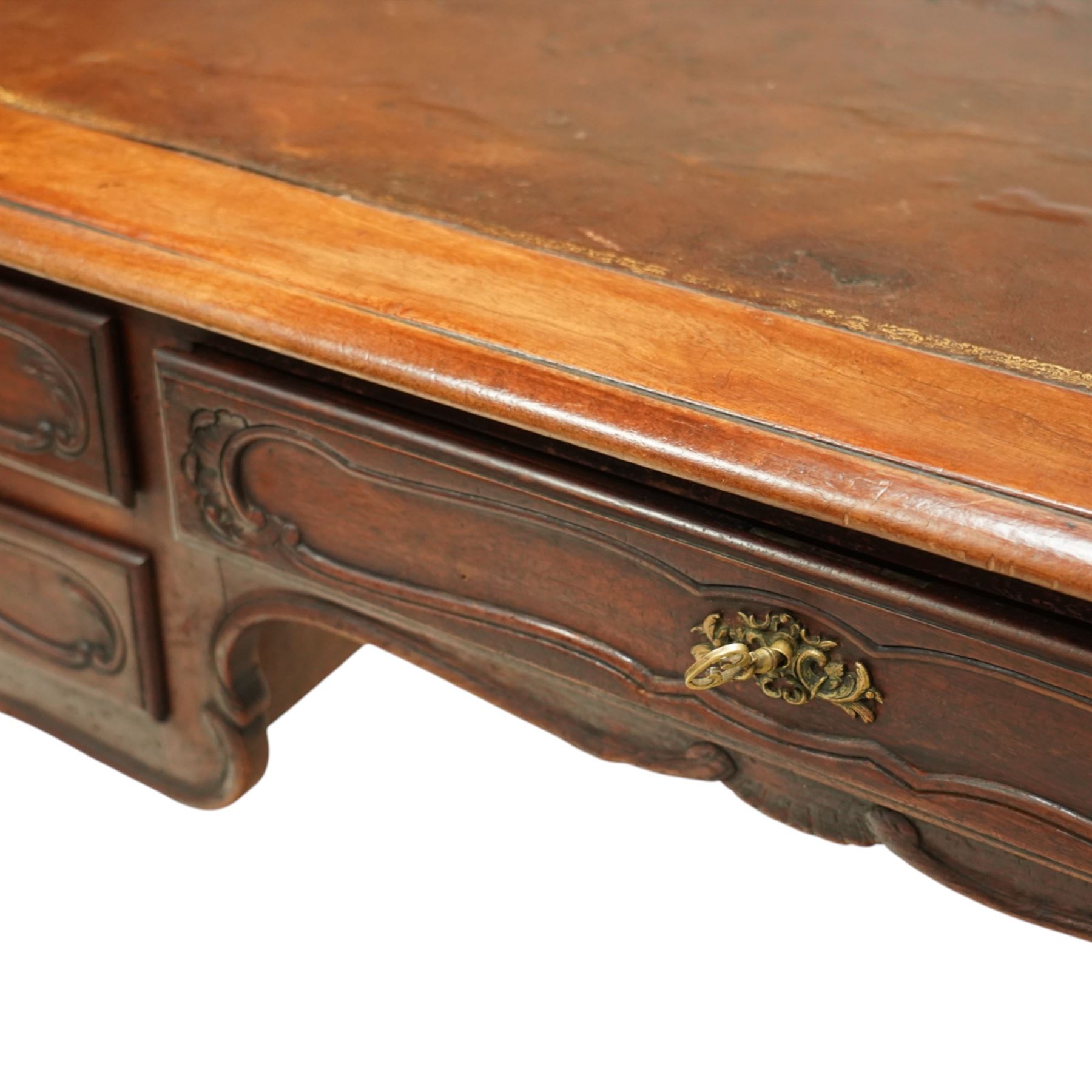 19th-century French mahogany Bureau Plat, inset tooled leather top over three frieze drawers, shaped apron, and cabriole legs carved with acanthus detail 