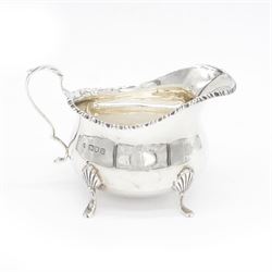 Edwardian silver cream jug, of oval form with crimped rim and acanthus capped C scroll han...