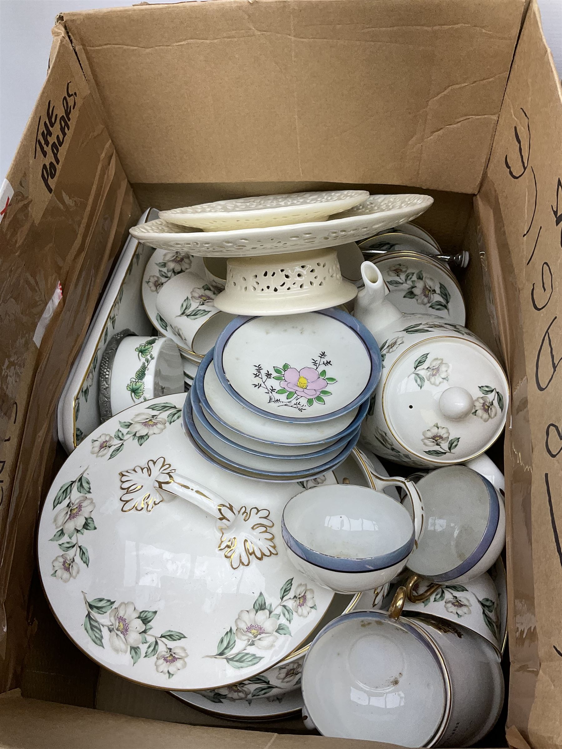 Collection of tea and dinner wares, including an extensive set of 'Christmas Rose' Crown Staffordshire, including tea and coffee wares and two lidded tureens, a blue and white decorated set of cups and saucers, cake stand etc, three boxes . 