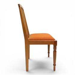 Knightman - set of nine cherrywood dining chairs, with fan splat backs and upholstered seats, raised on square legs joined by stretchers, comprising chairs of slight differing widths and one chair with turned front legs and orange upholstery and no Knight carving, the rest with recessed carved knight trademark, by Horace Knight of Old Mill Furniture, Balk near Thirsk 