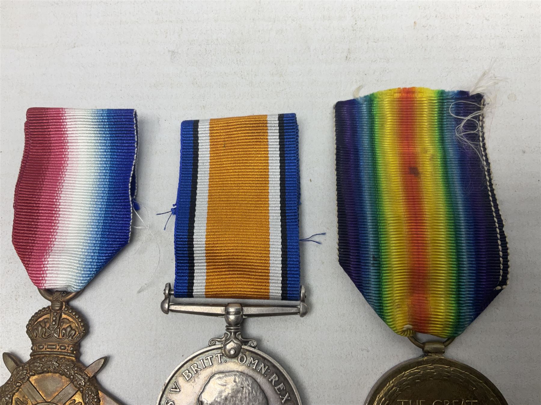 WW1 pair of medals comprising British War Medal and 1914-15 Star awarded to 1440 Pte. J. Wood Lan. Fus.; and WW1 Victory Medal awarded to 12128 Bmbr. R. Phillips R.A.; all with ribbons (3)