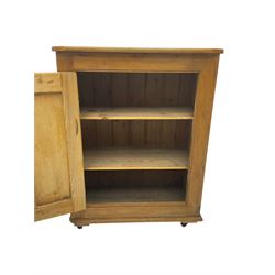 Pine standing cupboard, rectangular top with canted corners, fitted with single panelled door enclosing two shelves