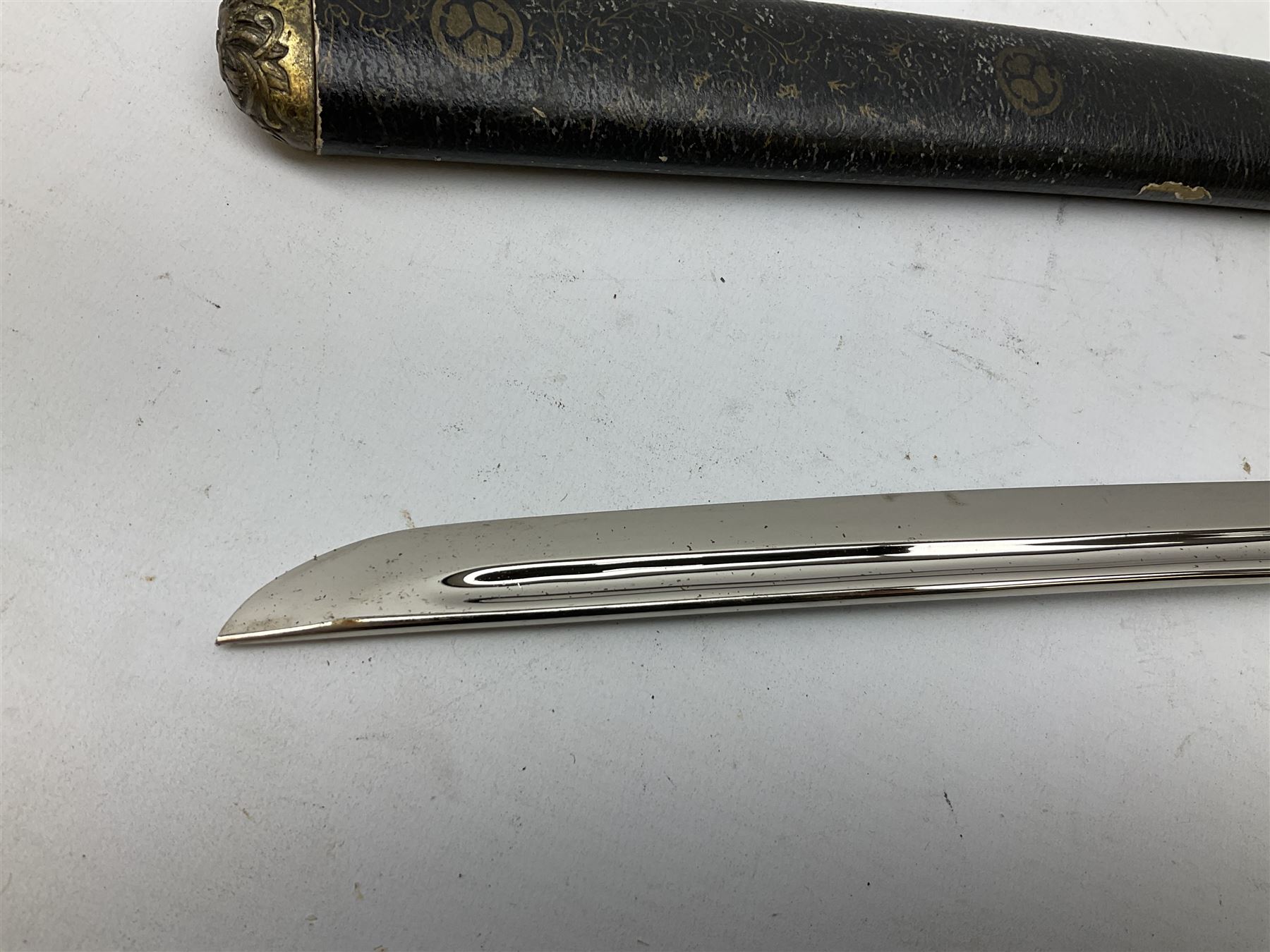 Three reproduction swords - Japanese katana and saya; Tai Chi sword with ornate scabbard; and dress sword with fullered triangular blade and horn handle (3)