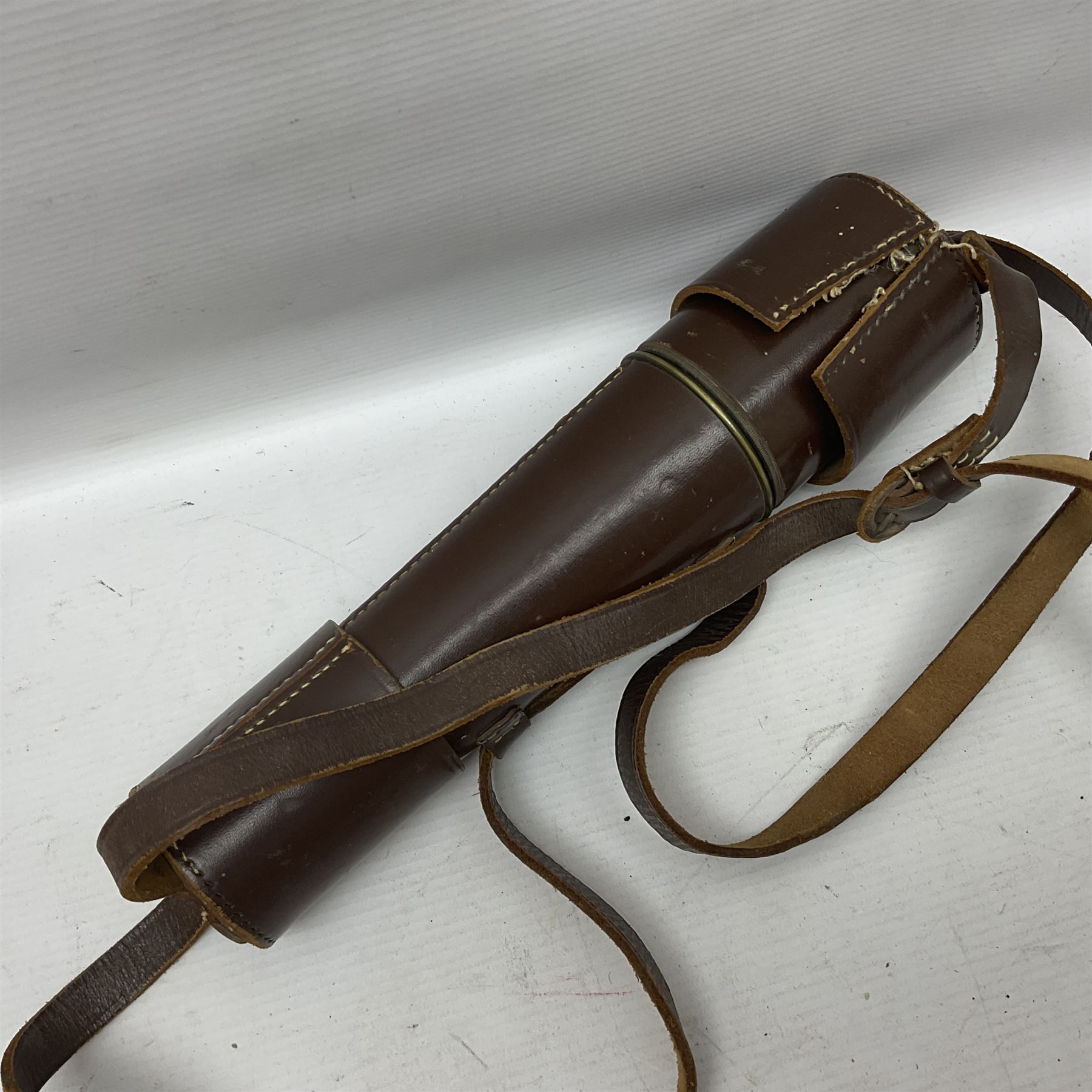 Broadhurst Clarkson brass and leather 4-draw telescope, the first draw with graduations, sliding lens shroud and leather covers for both ends on shoulder strap; marked 'Broadhurst Clarkson & Co. Ltd. 63 Farringdon Road London E.C.', L87cm fully extended; together with a WWI brass marching compass marked F-L No.123113 1918 (broad arrow); crudely etched L.H. McD. Latham; in associated Brooks & Co. leather case dated 1913 stamped W.B. Constable (2)