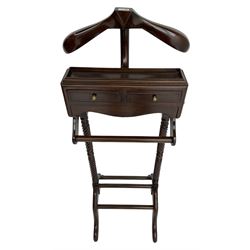 Regency design mahogany dumb-valet, fitted with jacket hanger, over two drawers and rail, twist-turned upright supports, on splayed feet united by shoe rests