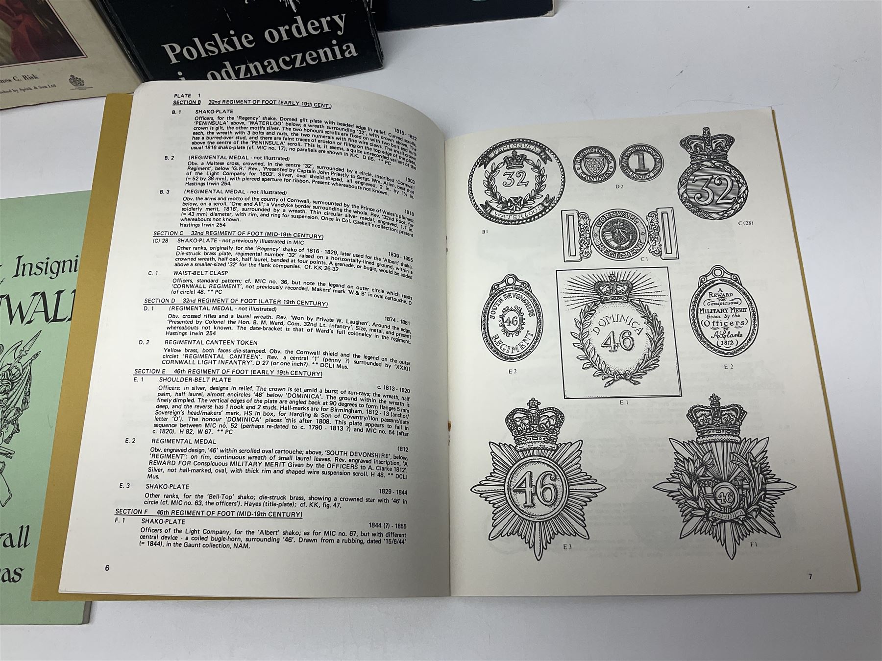 Five reference books on medals and orders including Vaclav Mericka: Book of Orders and Decorations; Polskie ordery i odznaczenia; James C. Risk: The History of the Order of the Bath; Guide des ordres, decorations et medailles militaires 1814-1963; etc; together with two works on Cornish Military Insignia; and Insignes De la Legion Etrangere (8)