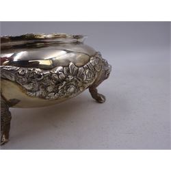 Early 20th century silver open sucrier, of circular form, with fluted gadrooned rim and decorated in relief with floral swags, united by three lion mask mounts and upon three paw feet, hallmarked Z Barraclough & Sons, London 1912, H6cm, D11cm, with similar spoon with lion mask finial, hallmarked London 1912, maker's mark indistinct