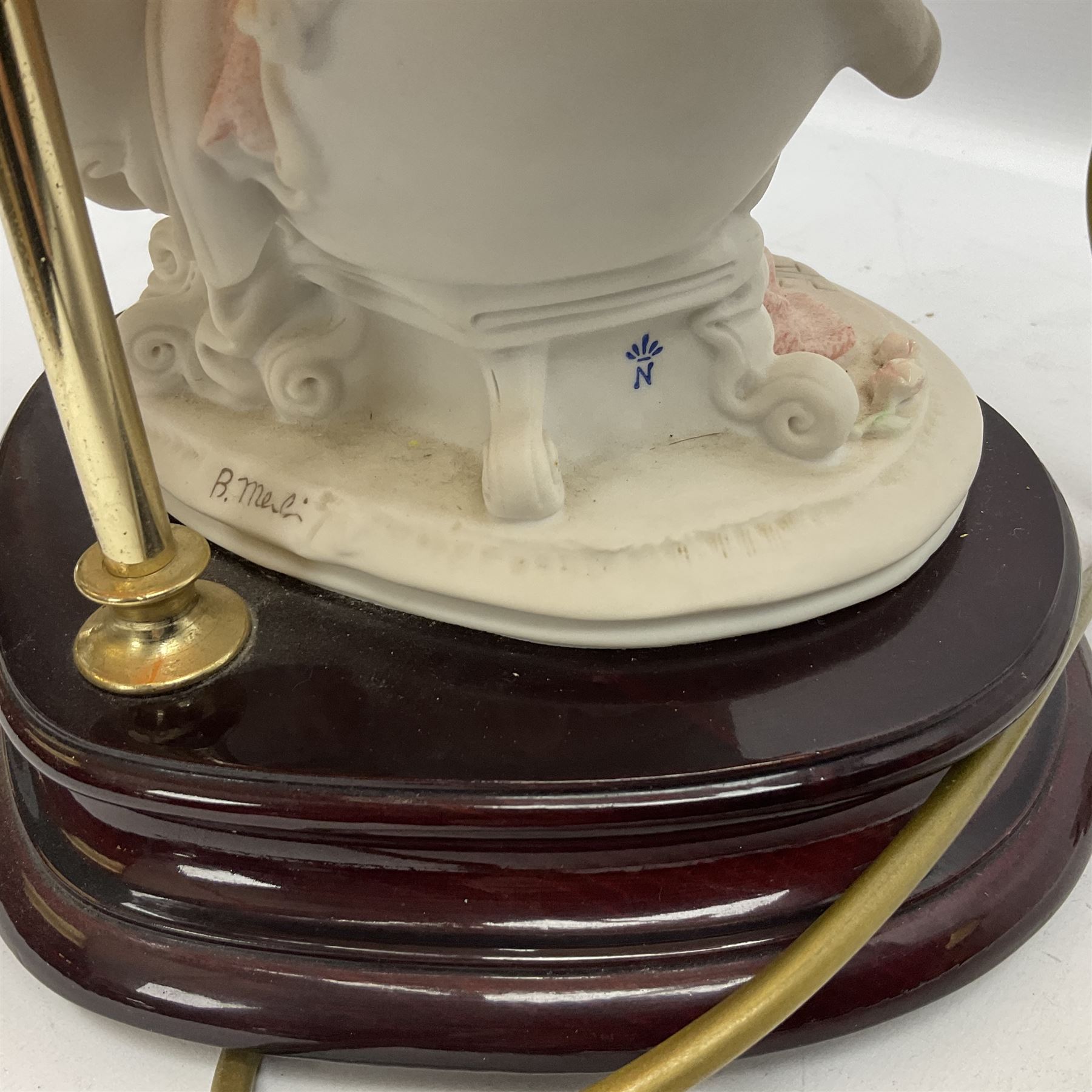 Capodimonte figural table lamp modeled as a woman and baby, signed B.Merli, with a tasseled shade, H59cm