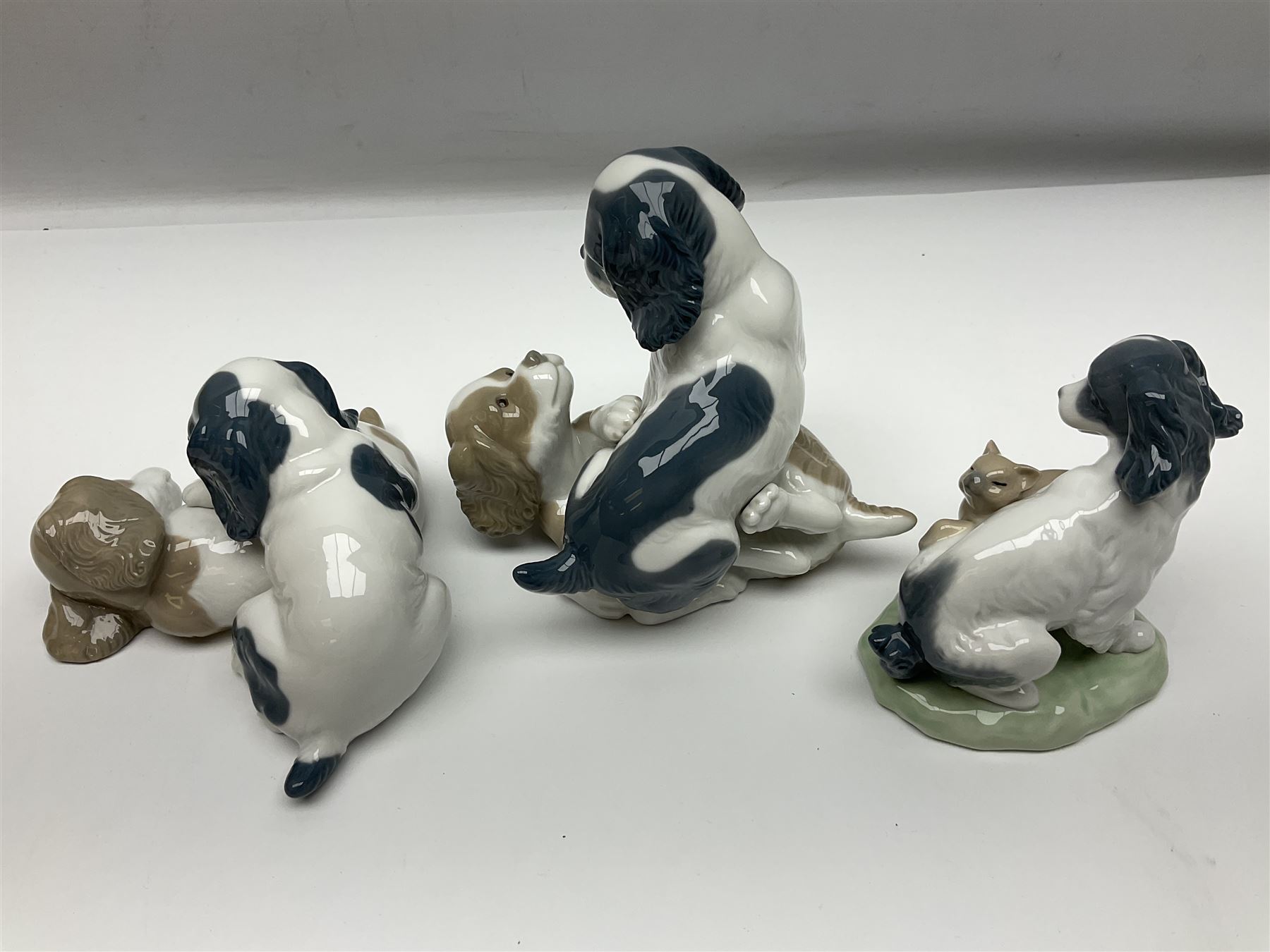 Ten Nao figures, to include three Cheeky Cherubs, Cat, Dog bride and groom etc