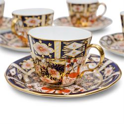 Set of nine Royal Crown Derby Imari 2451 pattern teacups and saucers 