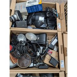 Collection of vintage cameras, projectors and accessories, including Kodak Brownies, Praktica, Polaroid, Ensign, light meters, flashes, etc