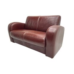 Two seat sofa, upholstered in burgundy leather
