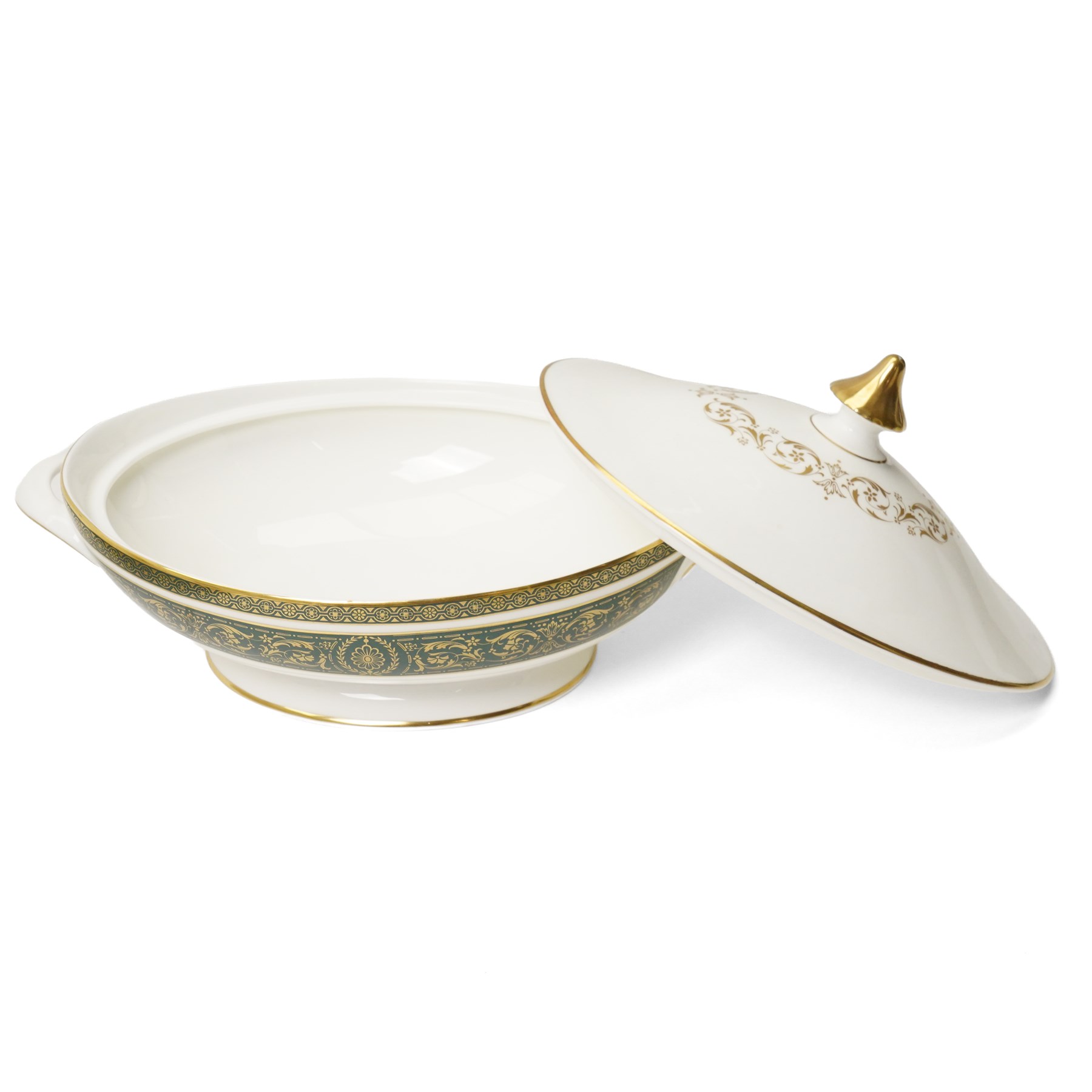 Royal Doulton Vanborough pattern part dinner service, comprising two covered vegetable dishes, open vegetable dish, eight dinner plates, oval serving dish, six soup bowls and two further bowls, eight side plates and eight dessert plates, six coffee cans and saucers, milk jug and a gravy boat and stand