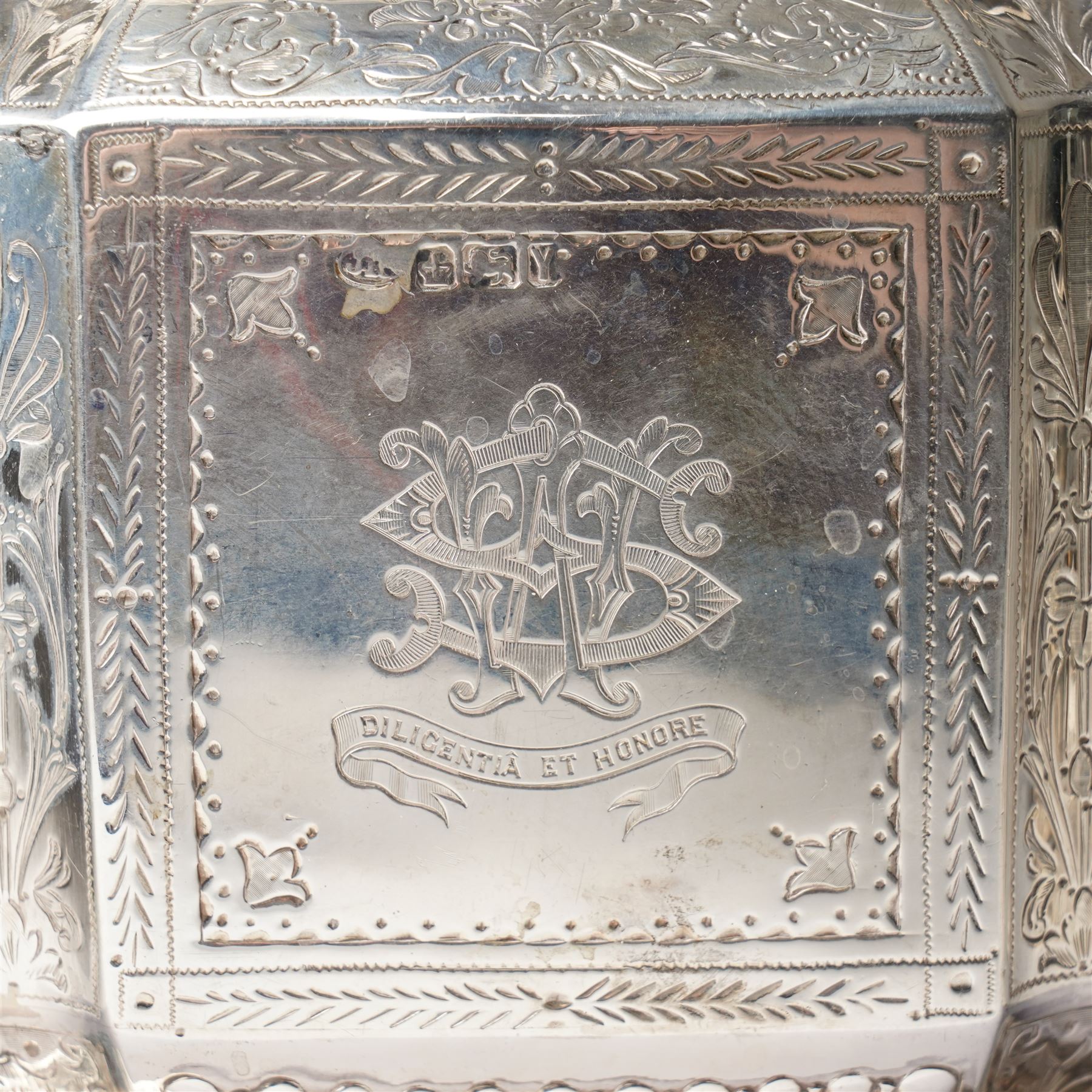 Victorian silver tea and coffee set engraved with classical urns, oval paterae and scrolling foliage, monogram and 'Diligentia et Honore' comprising teapot, tea kettle on spirit heater stand, coffee pot, two handled sugar bowl and cream jug Sheffield 1891 Maker John Round & Son Ltd