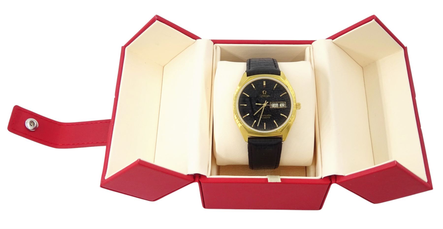 Omega Seamaster gentleman's gold-plated and stainless steel quartz wristwatch, Ref. 196.0126, Cal. 1345, black dial with baton hour markers and day - date aperture, on Omega black leather strap with buckle, boxed with Omega repair receipt dated 2023