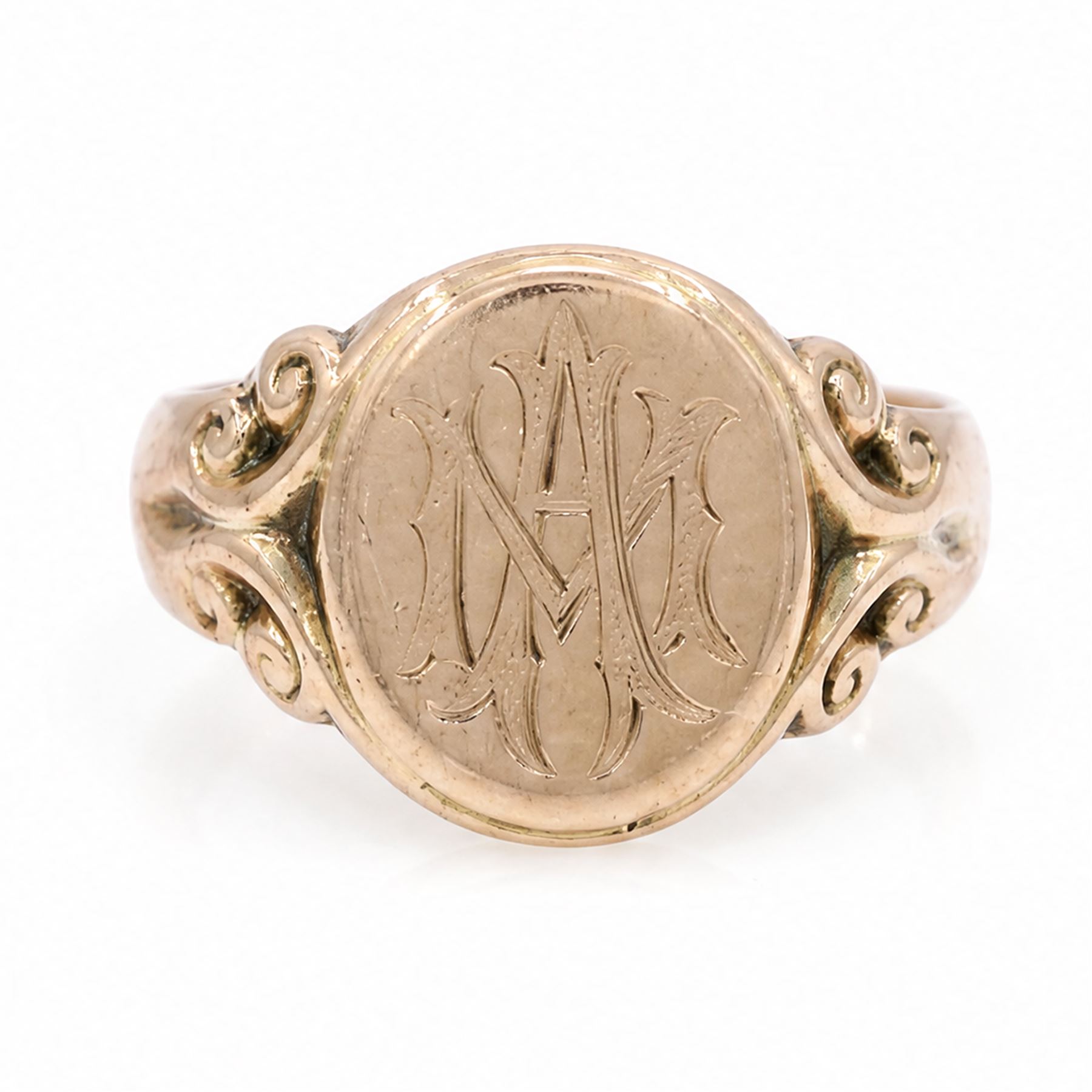 9ct rose gold signet ring, monogrammed with initials 'MA', with scroll design shoulders, Chester 1915
