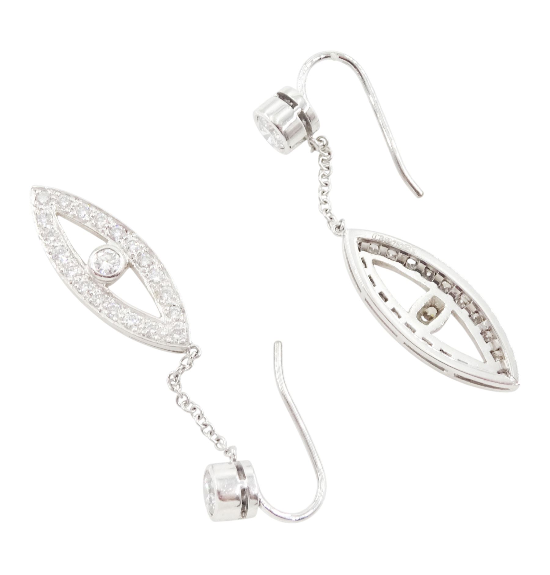 Pair of 18ct white gold round brilliant cut diamond pendant earrings, marquise shaped diamond drops, with central single stone diamond, suspending from trace link chain to a further single stone diamond, London 2009, total diamond weight approx 0.80 carat