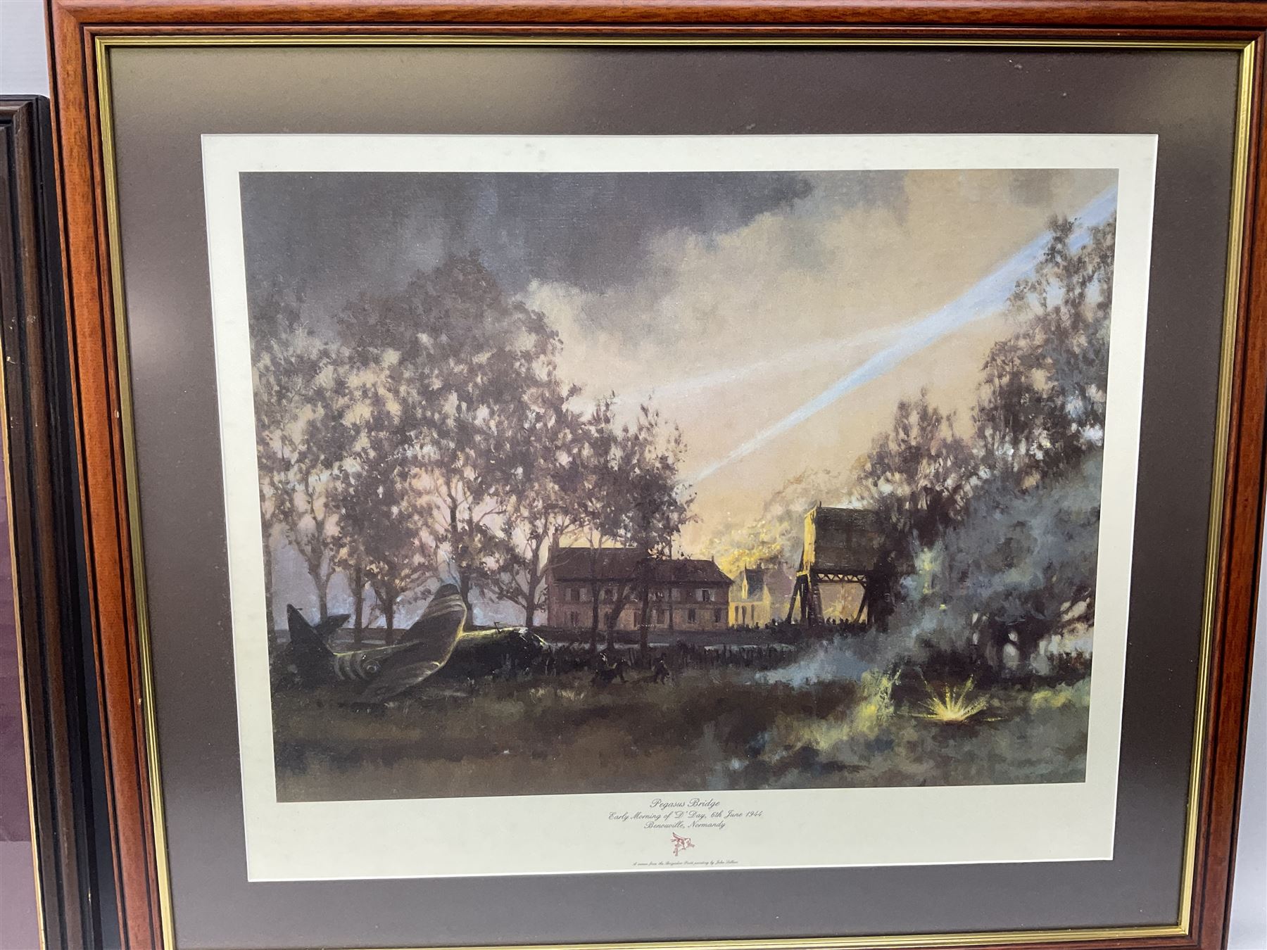 After Alan Fernley, colour print 'The Bridge at Arnhem', signed on the mount, 37 x 50cm; and after John Sellars, colour print 'Pegasus Bridge. Early Morning of D-Day 6th June 1944 Benouville Normandy'; both in mahogany stained frames (2)