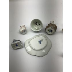 Group of Royal Copenhagen figures, comprising Girl with kitten, no.1779, White mouse on a chestnut, no.63, Mouse on a step, no.62 and White mouse, no.419, together with Royal Copenhagen pin dish and bell, all with printed mark beneath 