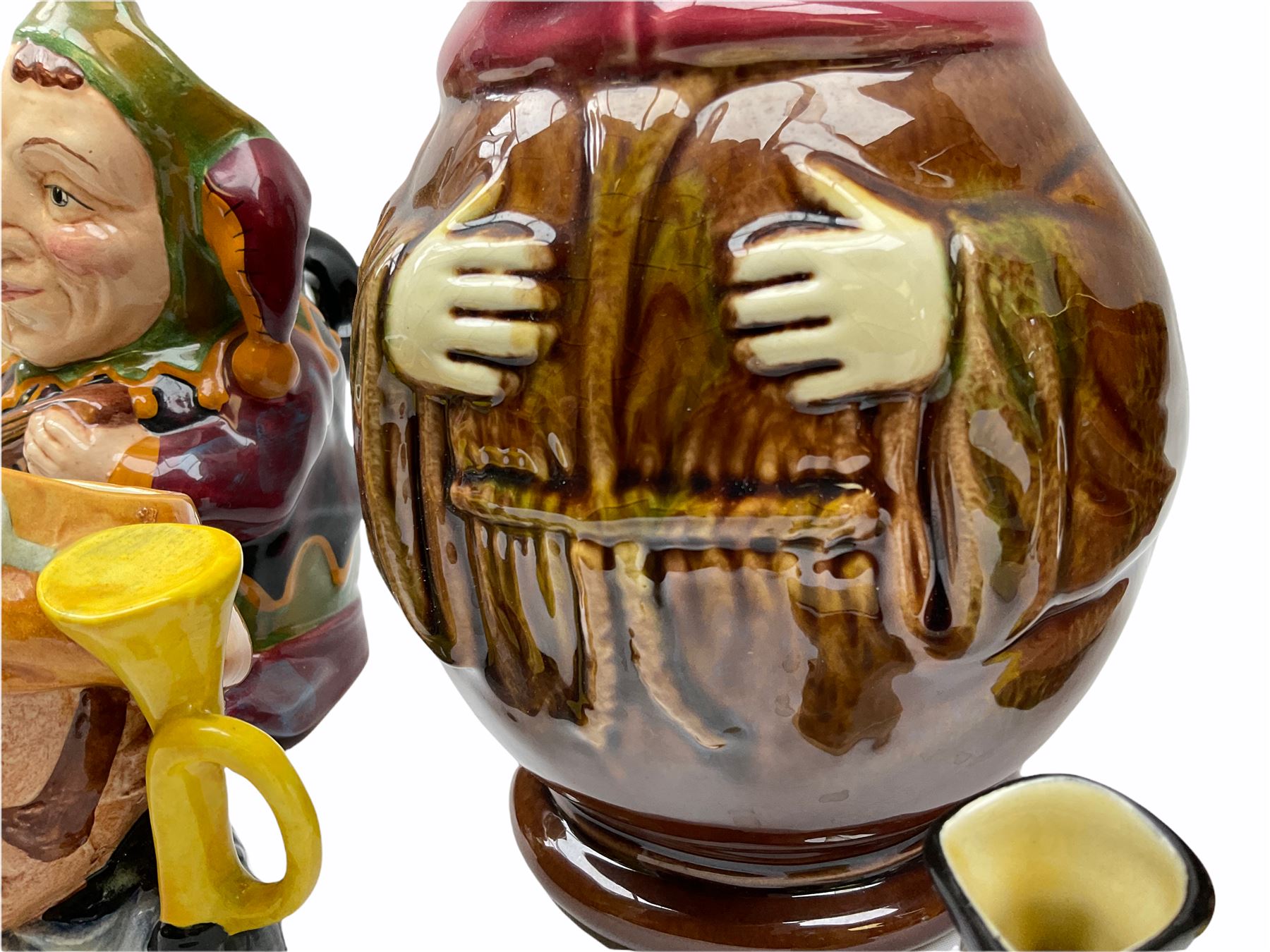 Character and toby jugs, including a staffordshire pottery style toby jug, Olfaire toby jug, Beswick character jug depicting Scrooge, Royal Doulton Veteral Motorist etc, together with Royal Doulton Sweet Dreams figure. 