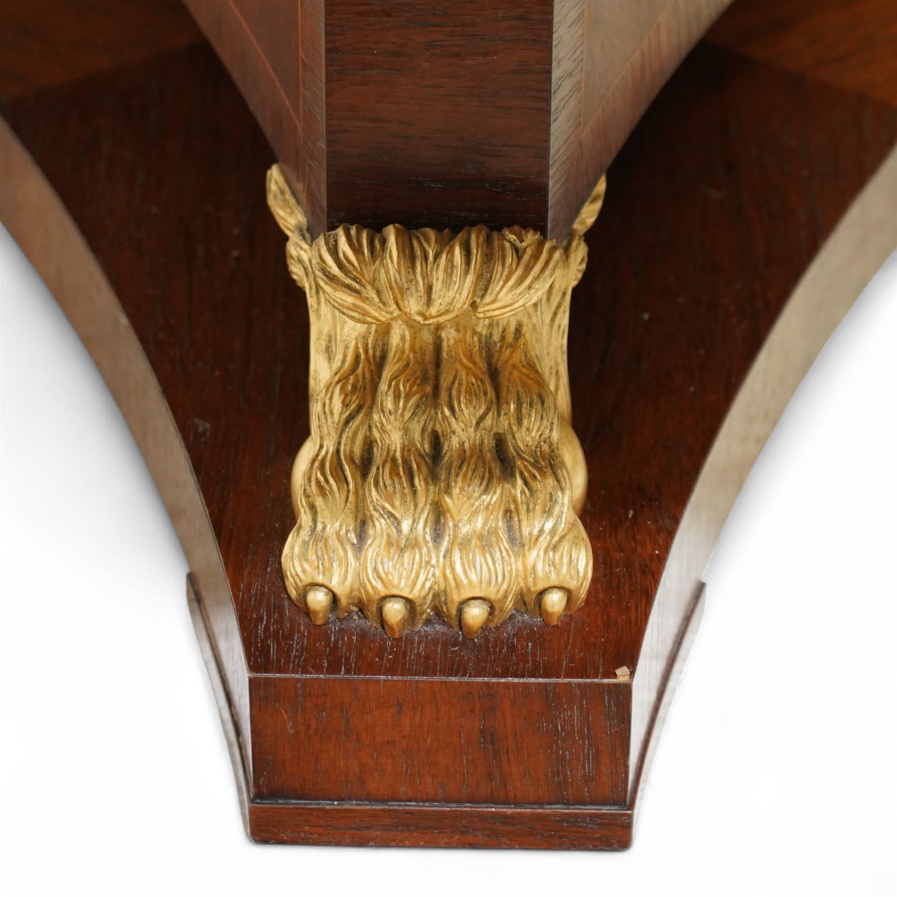 Arthur Brett & Sons - late 20th century twin pedestal dining table in the Second Empire style, the oval Amboyna burl veneered top, bordered with tulipwood crossbanding and delicate floral marquetry inlay, and rosewood crossbanded outer border within gilt gadrooned edge, over two mahogany triform pedestal bases with rosewood crossbanding and decorated with neoclassical marquetry of tied ribbons, leafy sprays, and scrolling acanthus decoration, raised on carved and gilded lion paw terminals on plinth bases, underside with maker's label