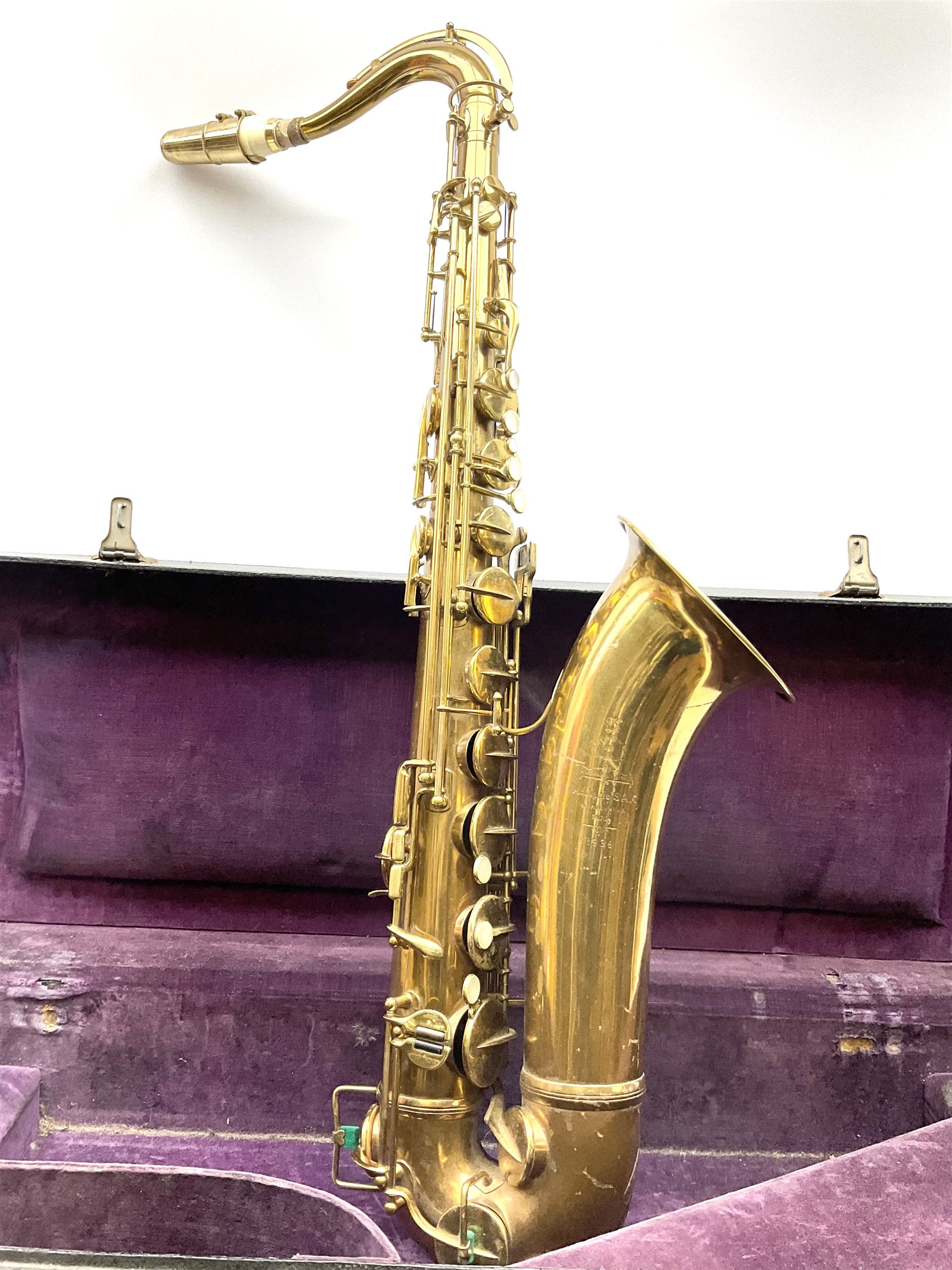 Brass tenor saxophone by Adolphe SAX, 84 Rue Myrha, Paris,  No.938 serial number 12097, H75cm excluding crook; in hard carrying case bearing plaque for Henri Selmer
