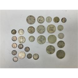 Approximately 28 grams of pre 1920 silver coins including four pence pieces and approximately 120 grams of pre 1947 silver coins including 1926 halfcrown etc