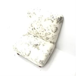 Wide seat nursing chair upholstered in an ivory ground fabric with floral pattern, turned supports, W63cm