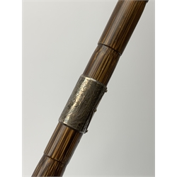 A 1920's silver mounted ebonized walking cane, the silver flat topped handle with engraved foliate detail hallmarked Kendall & Sons Ltd, London 1923, L91.5cm, two further silver mounted walking canes, the largest example hallmarked London, date letter worn probably 1920, maker's mark worn and indistinct, the smaller example hallmarked Birmingham 1911, maker's mark worn and indistinct. 