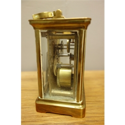  20th century brass and bevel glazed carriage clock, single train movement with platform escapement, with hinged leather case, H12cm (clock)  