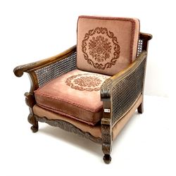 Early 20th century bergere armchair, double cane work sides, acanthus carved scrolling arms and supports 