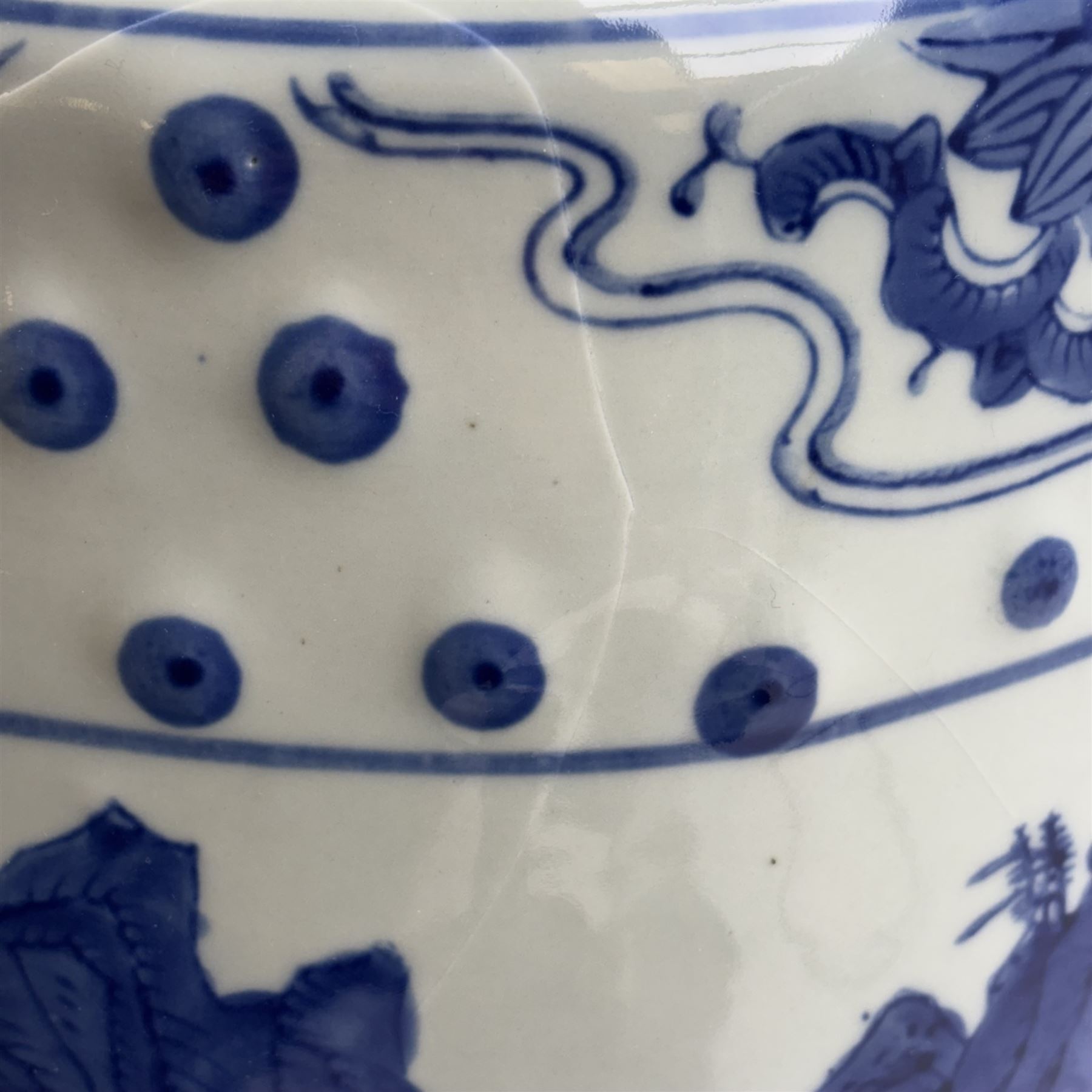 Pair of Chinese blue and white garden stools, decorated with pagodas a landscape, H40cm 