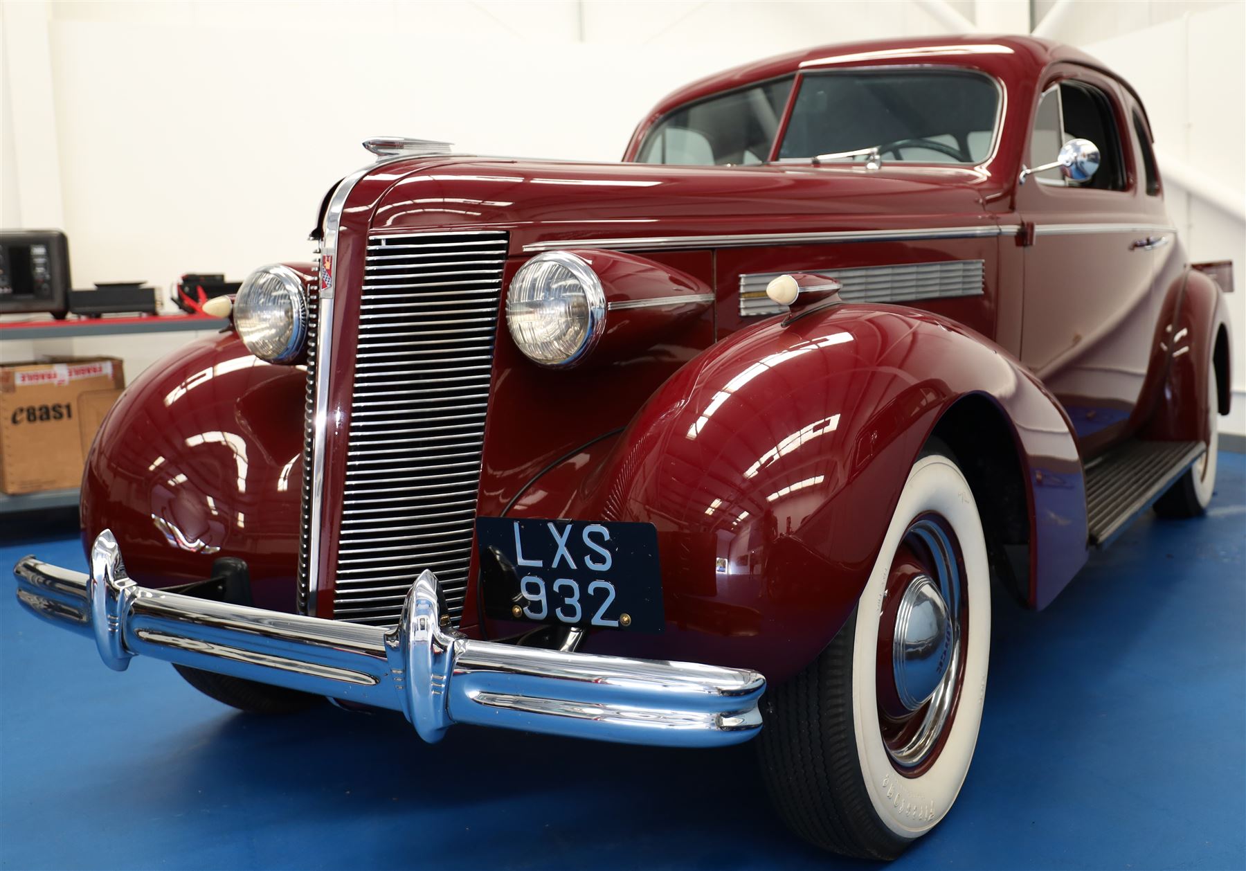 1937 Buick Special Sport Coupe

Registration: LXS 932
Serial number: 744273817
Engine: 4,064cc straight-eight petrol
Odometer reading: 6,476 miles
Steering: Left-hand drive
Colour: Deep maroon
V5C: Present
Keys: One

From the Estate of the late John Sils.

A striking 1937 Buick Special Sport Coupe, finished in deep maroon and manufactured at the General Motors plant in Oshawa, Ontario, Canada.

The Buick Special formed part of the marque’s Series 40 range and combined dramatic period styling with Buick’s smooth 248cu in, approximately 4,064cc, straight-eight engine. The Sport Coupe was among several body styles offered for 1937 and is distinguished by its sweeping wings, prominent vertical grille, split windscreen and enclosed rear luggage compartment.

This example was imported into the United Kingdom and first registered here in November 2019, receiving the registration LXS 932. The odometer displays 6,476 miles, although this mileage has not been independently verified.

The car is very well presented throughout, with excellent deep-maroon paintwork, extensive brightwork and a highly detailed period Art Deco interior featuring its dashboard, centrally mounted ventilation grille, original-style instrumentation and controls. The luggage compartment is neatly trimmed and incorporates a securely mounted spare wheel beneath a raised floor.

The underside also presents particularly well, appearing clean and extensively finished in black, with the chassis, suspension, axles and associated components showing evidence of careful restoration and ongoing maintenance.

Overall, this is an impressive and imposing pre-war Buick, presented in very good condition throughout.

Features

• Canadian-built Buick Special Sport Coupe
• Manufactured at General Motors, Oshawa, Ontario
• 4,064cc straight-eight engine
• Left-hand drive
• Deep-maroon exterior finish
• Extensive chrome brightwork
• Split windscreen
• Period Art Deco interior
• Original-style dashboard and instrumentation
• Dashboard-mounted clock
• Front bench seating
• Enclosed rear luggage compartment
• Underfloor spare wheel
• UK registered since November 2019
• V5C present
• One key

Condition

Presented in very good condition throughout, with excellent paintwork and a clean, highly detailed underside.

This vehicle forms part of the Estate of the late John Sills and is offered for sale by the Executors, providing a genuine reason for sale.