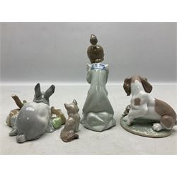 Four Lladro figures, comprising It Wasn't Me no 7672, Sleeping Kitten no 5712, Mini Cat no 5308 and Rabbit Eating no 4773, all with original boxes, largest example H17cm 