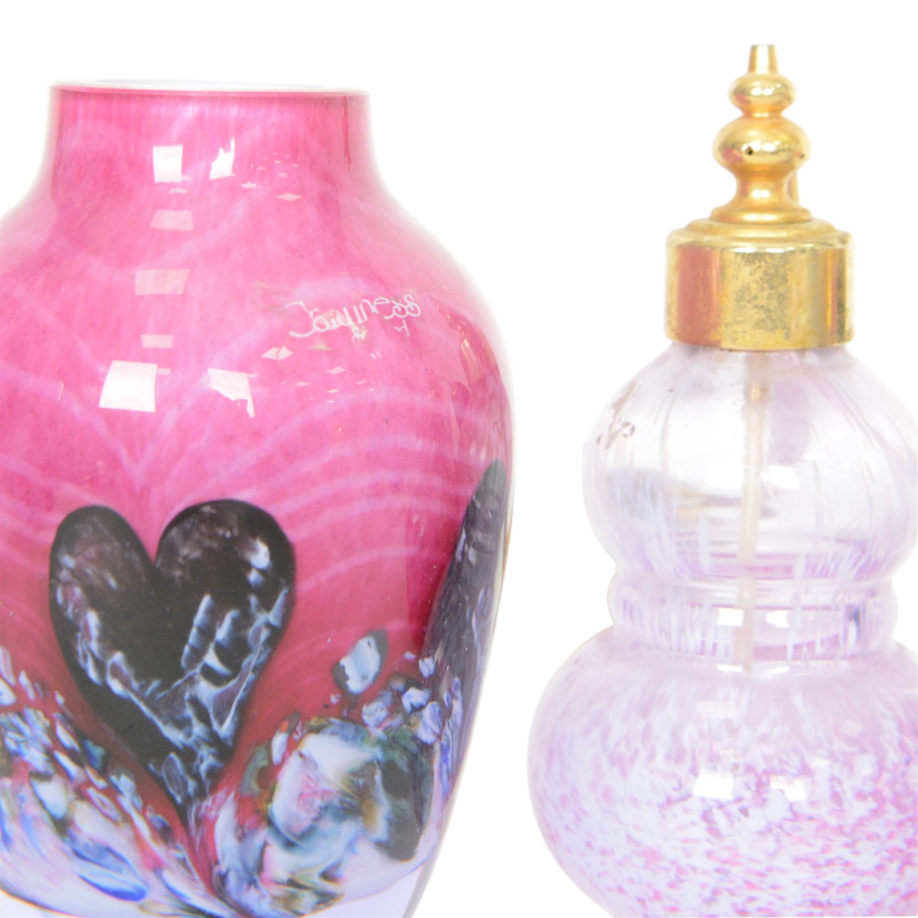 Four Caithness perfume bottles, together with seven Caithness vases 