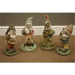  Four painted garden gnome ornaments   