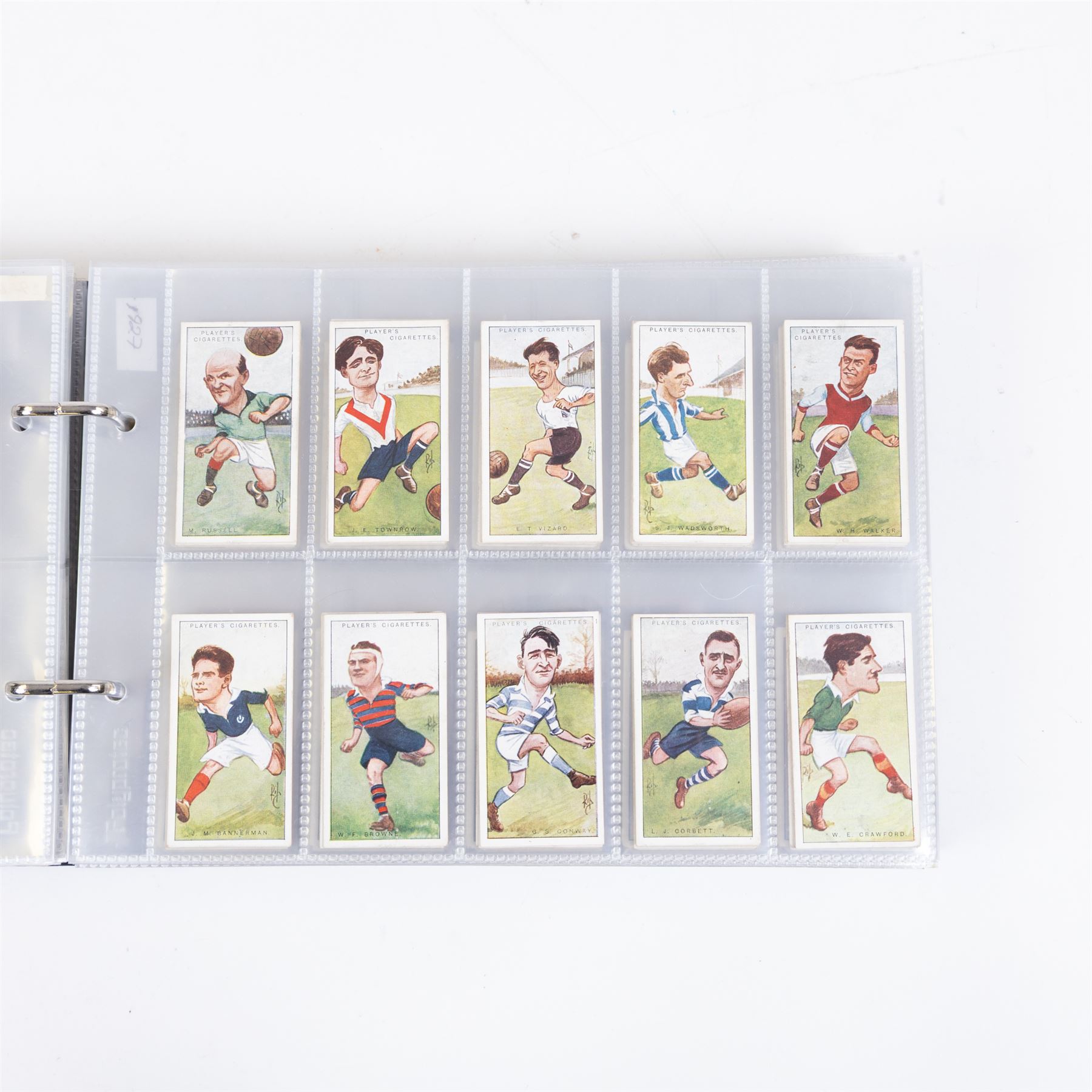 Collection of Edwardian and later Football related trading and cigarette cards, including forty-nine of fifty 1906 Ogden's Football Club Colours, 1922 PALS Footall series, ninety of one hundred 1925 Gallaher Famous Footballers, complete set of forty-four 1926 Ogden's Captains of Association Football Clubs and Colours, complete set of fifty 1927 Players Football Caricatures by MAC,  complete set of fifty 1927 Players Football Caricatures by RIP,  complete set of fifty 1930 Players Association Cup Winners, complete set of 50 1933 Ogdens AFC Nicknames etc, housed in brown cigarette card album