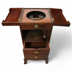 Early 19th century and later mahogany washstand, the dual-hinged fold-out top, over a cupboard enclosed by tambour roll, fitted with deep drawer to base disguised as two cock-beaded drawers, on splayed supports