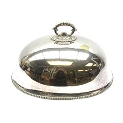 A large silver plated meat dome with scrolled handle and beaded decoration, L50cm