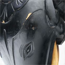 Elephant ebonised jardinière, moulded circular top raised on carved Elephant supports united by a shaped undertier
