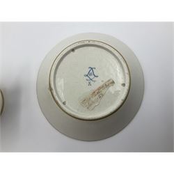 Sèvres soft paste porcelain coffee can and saucer with date code for 1754, painted and gilded with flowers, dangling from the shaped green border, interlaced LL monogram enclosing the date letter A above painters mark for Dodin, coffee can H7cm, saucer D14.5cm