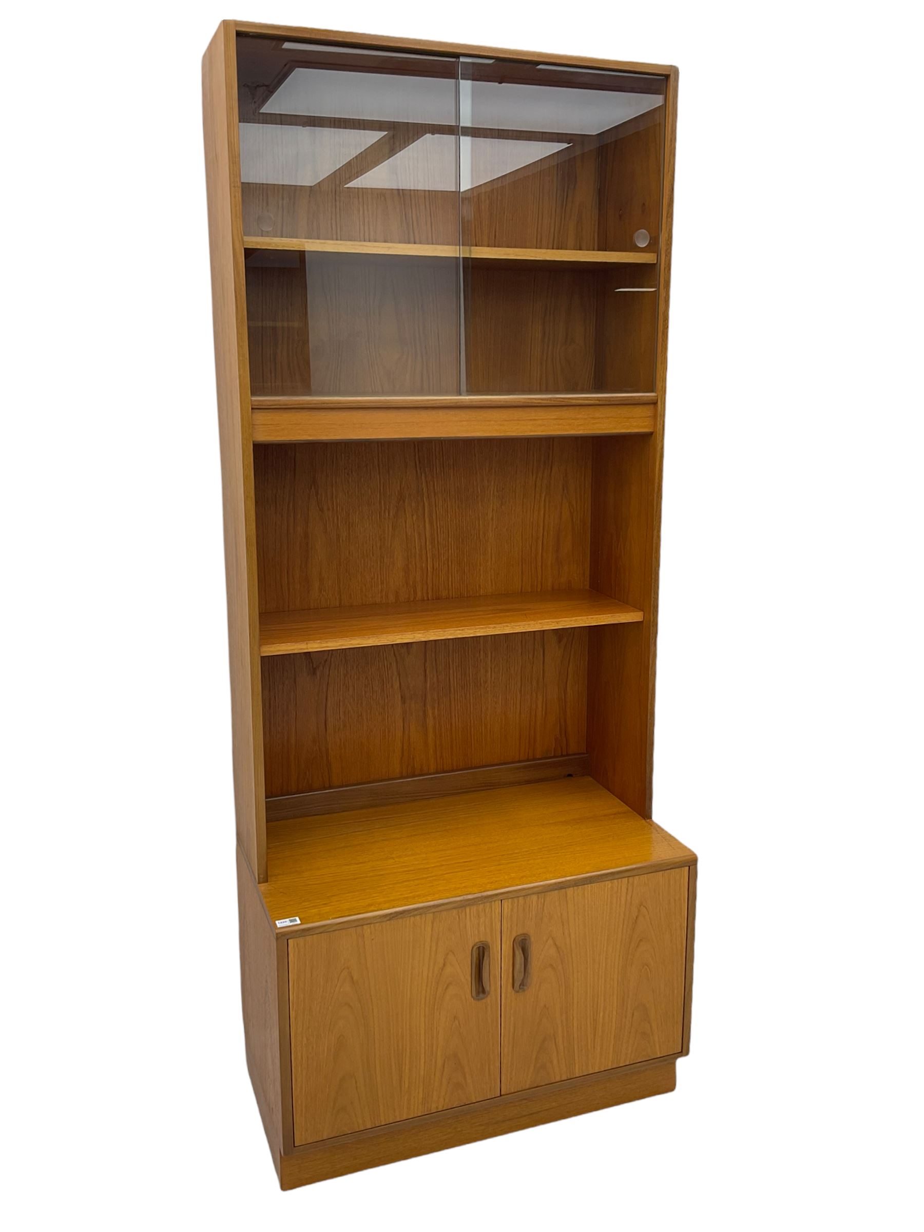 G-Plan teak two sectional modular wall display cabinet, fitted with sliding glass doors, double cupboard and three drawers