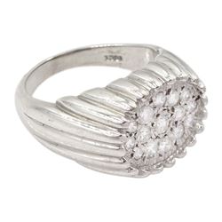 White gold diamond ring, fifteen pave set round brilliant cut diamonds, in an oval setting, stamped 18ct, total diamond weight approx 0.70 carat