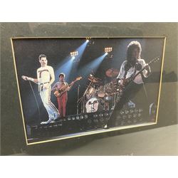 Queen - A Night At The Opera; fabric Stage Pass signed by all four members Freddie Mercury, Brian May, Roger Taylor and John Deacon 14 x 9.5cm; mounted in a modern frame with print of the band during a performance