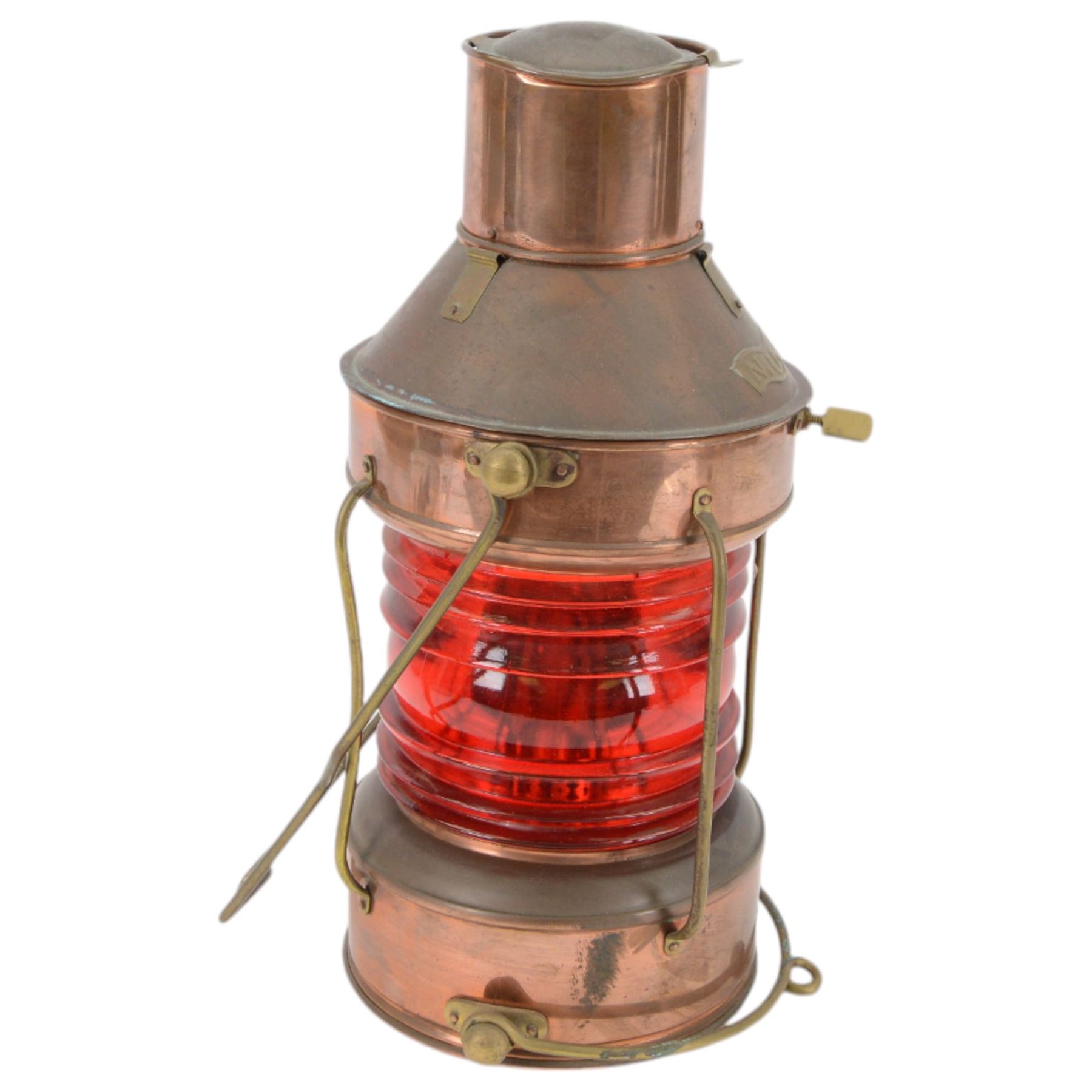 Copper ships lantern with red glass, marked NUC with brass handles and fittings, H46cm