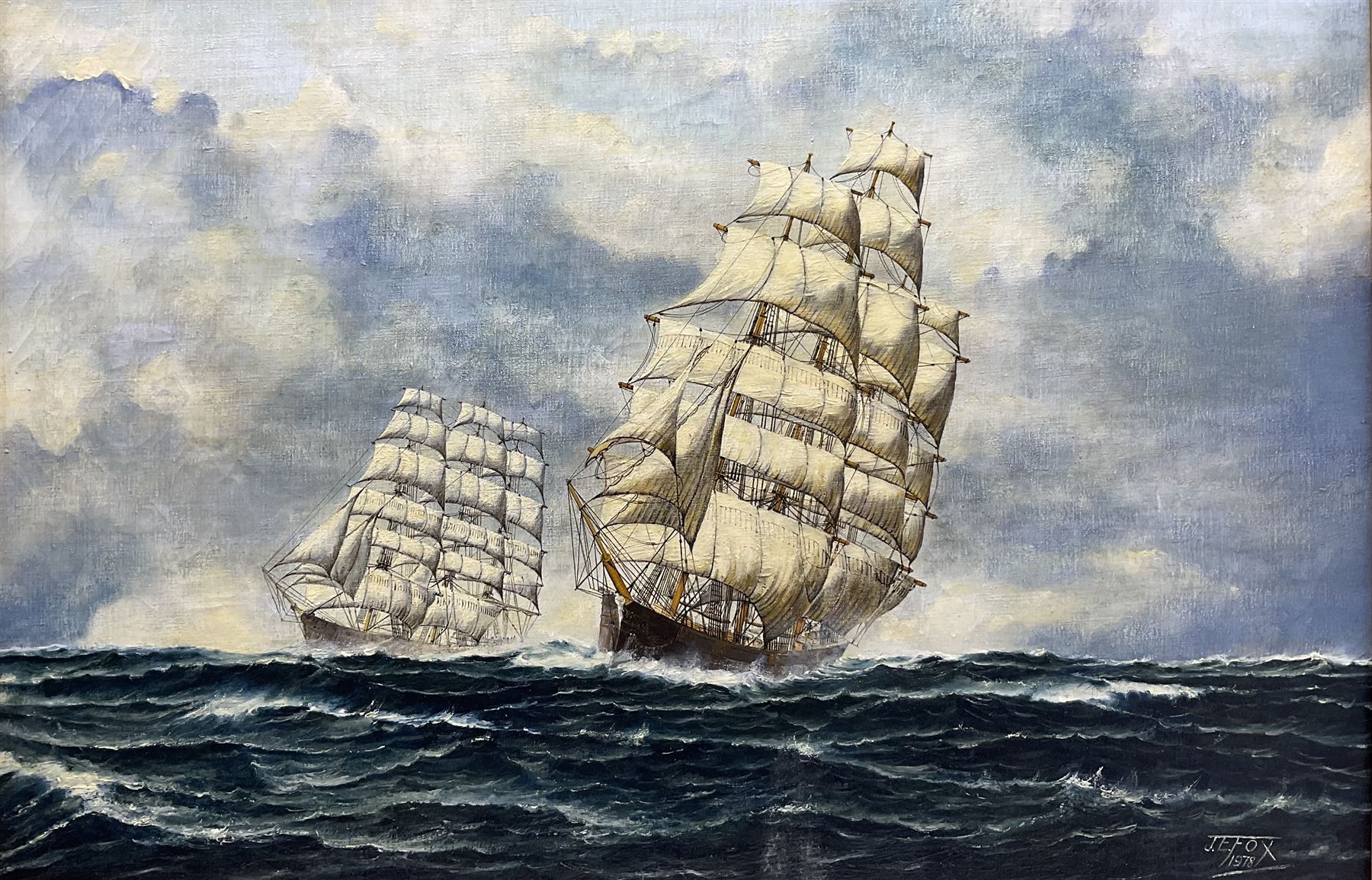 JE Fox (British 20th Century): Two Clippers at Sea, oil on canvas signed and dated 1978, 49cm x 74cm 