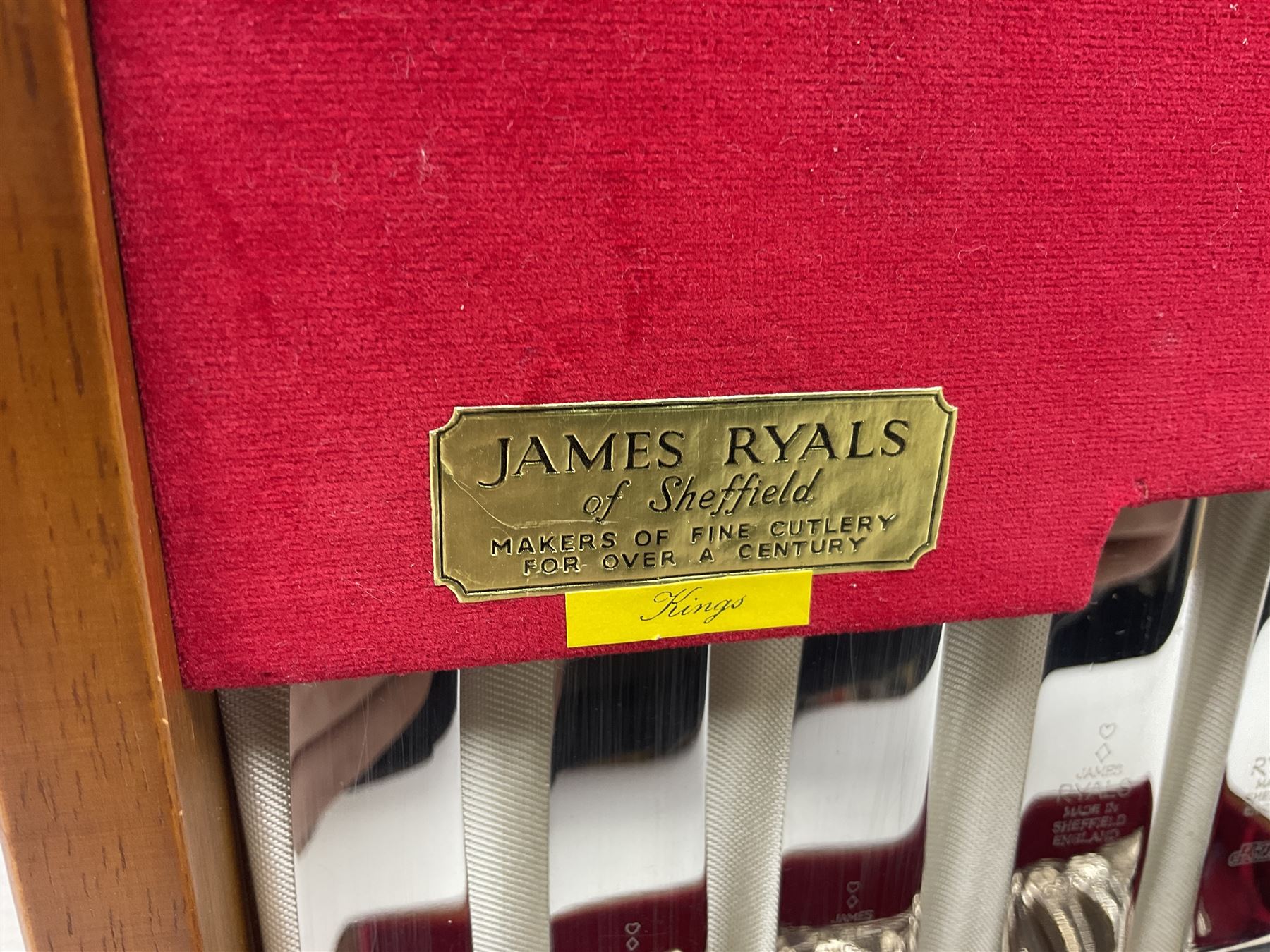 Canteen of King's pattern cutlery for six place settings by James Ryals of Sheffield, with two extra forks, pair of salad servers and six fish knives, all within fitted wooden case, together with six ivorine handled butter knives and six silver plated cake forks