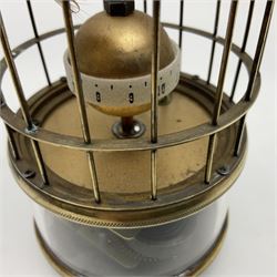 Automation bird cage clock of predominantly brass construction with central rotating orb and two birds with feathered decoration, H19cm