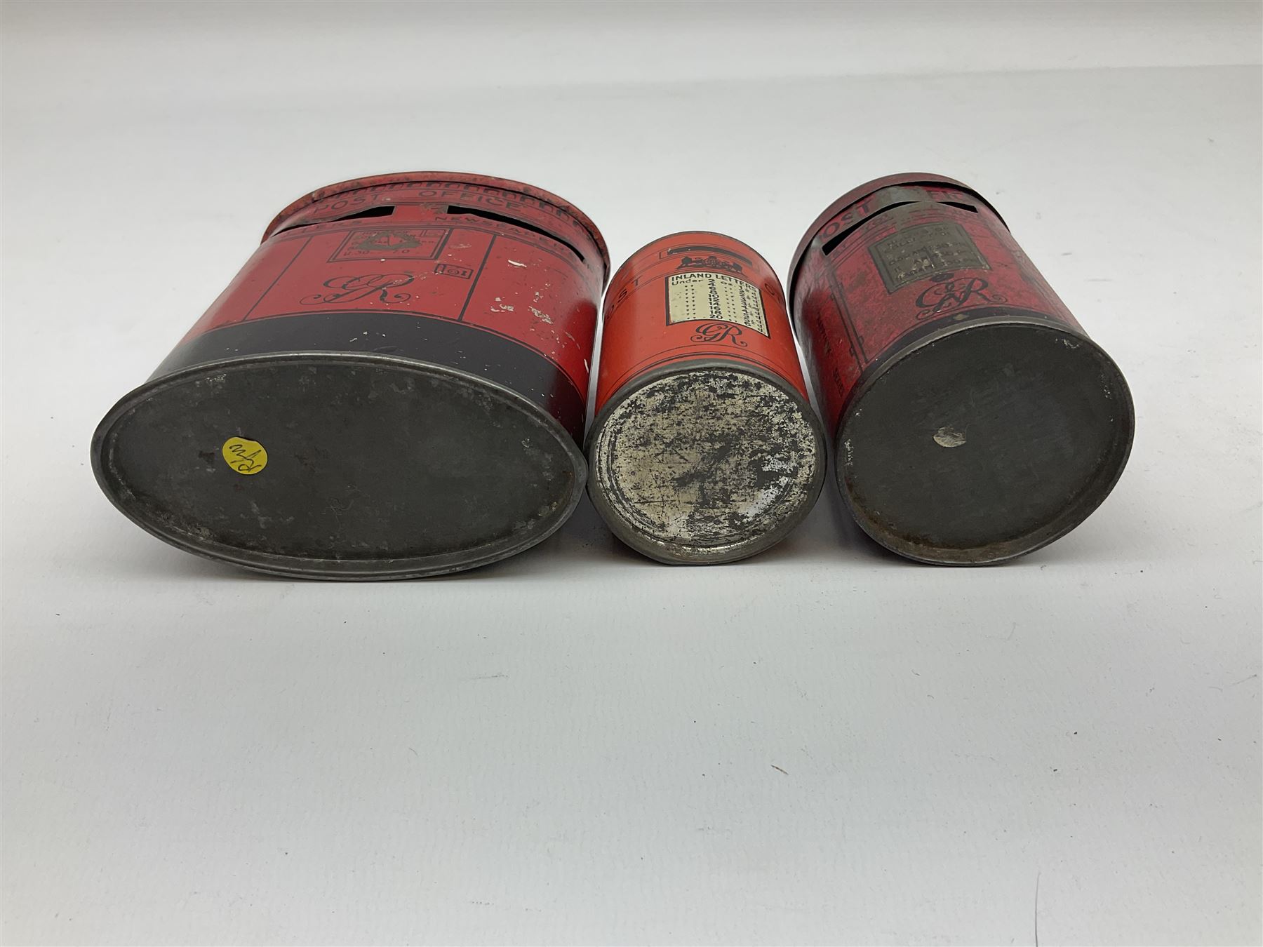 Collection of tin plate money boxes in the form of Royal Mail post boxes, to include four Chad Valley examples, one with key and others similar,  marked VR, GR and ER (10)