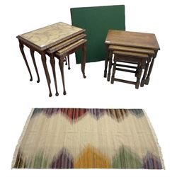 Mid-20th century nest of three walnut tables (W56cm, H56cm, D40cm); flatweave rug with multi-coloured upright borders (184cm x 119cm); nest of three oak tables (W51cm, H47cm, D34cm); and a folding card table